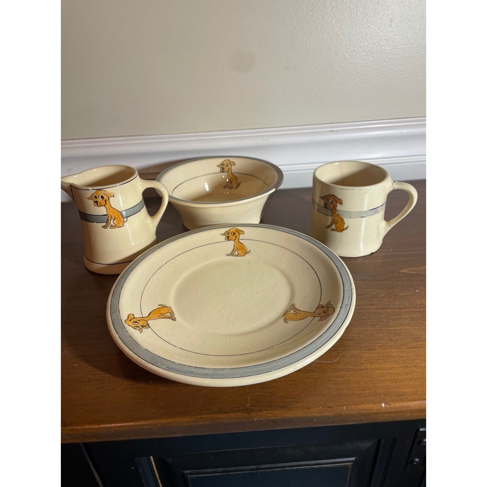 Vintage Roseville Pottery Set Puppy Dog Bowl Plate creamer and cup 4 piece set.